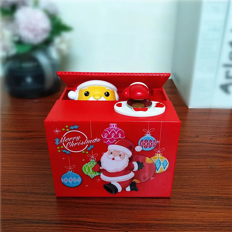 A red box for an interactive coin bank with animal designs, featuring a yellow and red animal figure and Santa Claus.