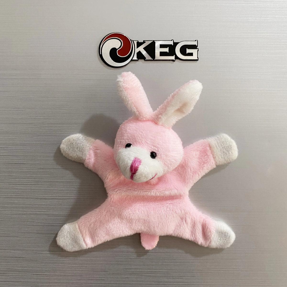 Pink rabbit fridge magnet featuring a cute animal design.