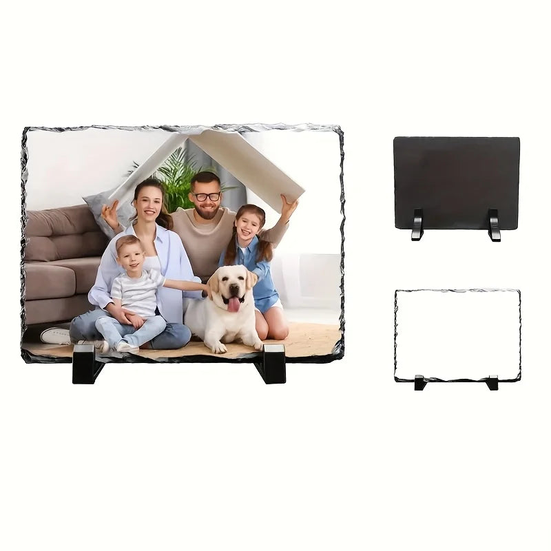 A family of three and a dog posing behind a rectangular slate photo frame with an open display stand.