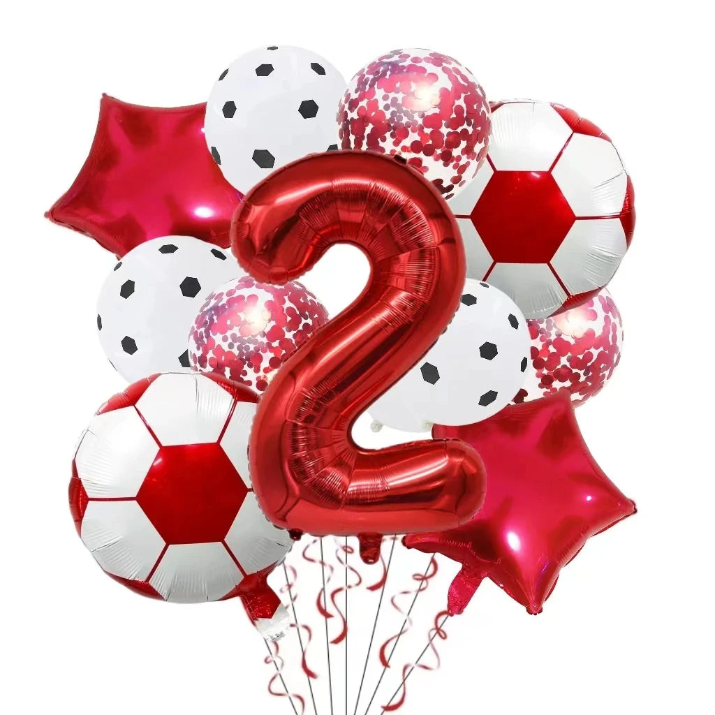 A collection of red and white football-shaped helium foil balloons for birthday party decorations.