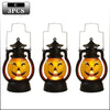 Three black pumpkin lanterns with glowing orange LED faces for Halloween decoration