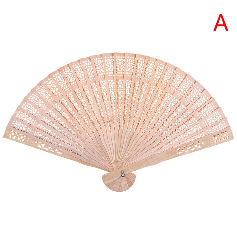 A light beige lace folding hand fan with a delicate, fan-like design.