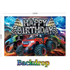 A large backdrop featuring monster trucks, checkered flags, and a birthday theme for a party.