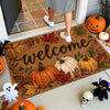 A vintage harvest pumpkin maple leaf doormat featuring pumpkins, leaves, and a welcome message on a light-colored entryway ru