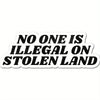 Black and white text decal that reads No One Is Illegal On Stolen Land