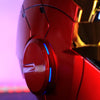 Close-up of a red Iron Man MK5 wearable helmet with blue LED lights and a circular control button.