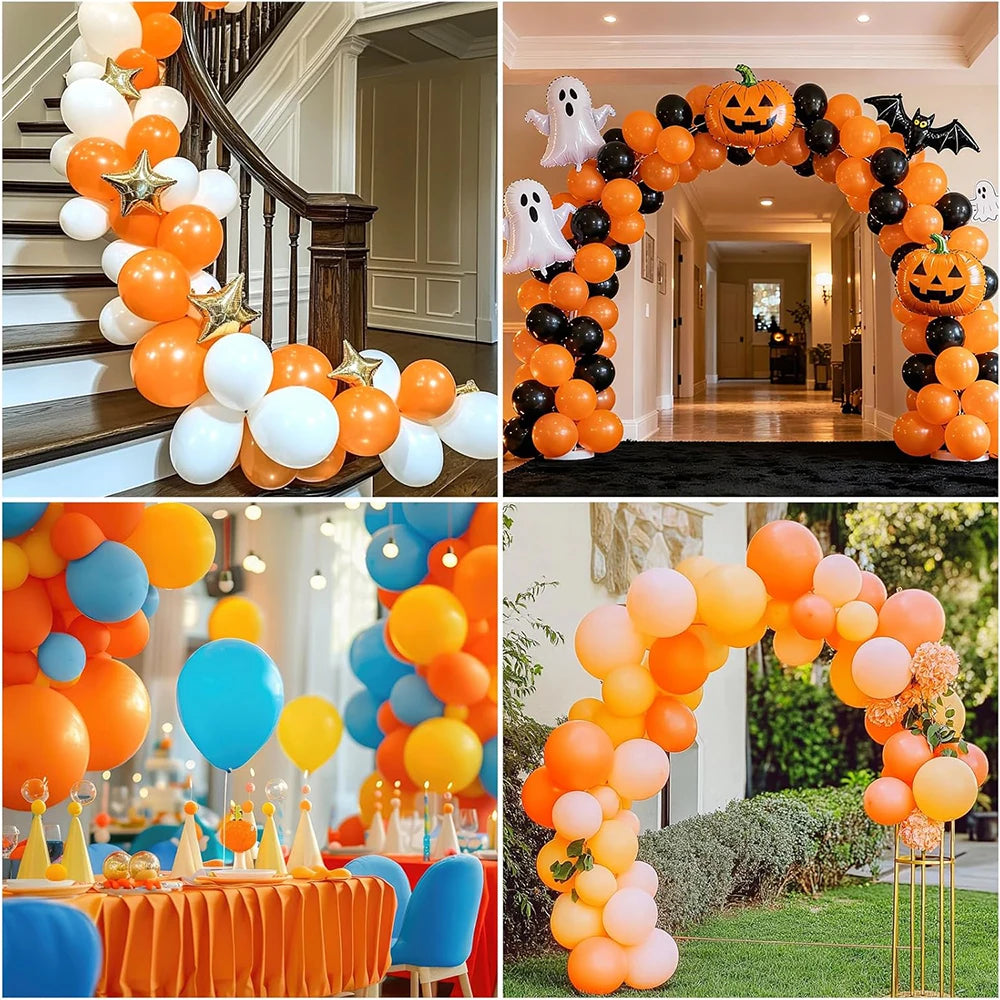 A close-up of an orange balloon arch decorated with black and white balloons for a party.