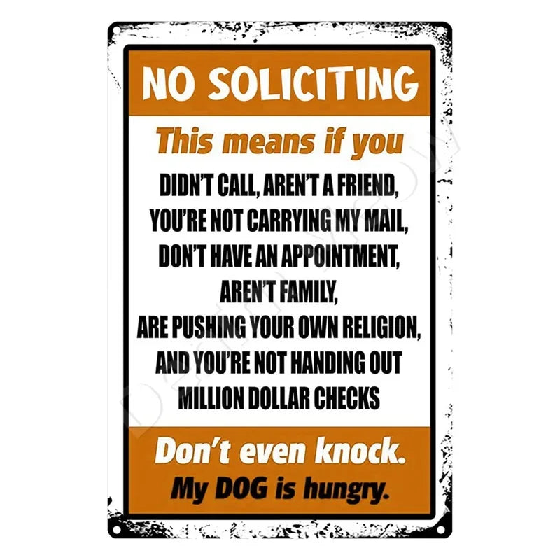 A humorous metal sign with text advising against soliciting, stating that if you don't call or have an appointment, you shoul