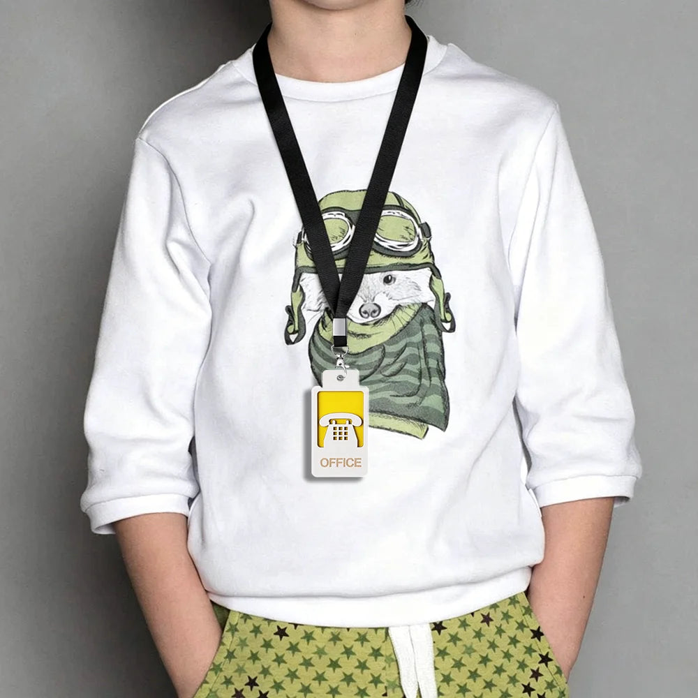 A white long-sleeve shirt features a graphic of a panda wearing glasses and holding an acrylic hall pass lanyard.