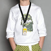 A white long-sleeve shirt features a graphic of a panda wearing glasses and holding an acrylic hall pass lanyard.