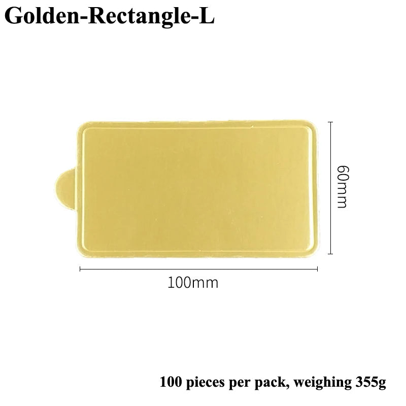 A rectangular, light yellow Golden-Rectangle-L dessert cake board, 100 pieces per pack, weighing 355g.