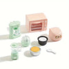 A set of realistic kitchen appliance dollhouse accessories including a pink toaster and a pink blender.
