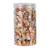 A clear jar filled with shiny gold foil flakes for resin art and jewelry making