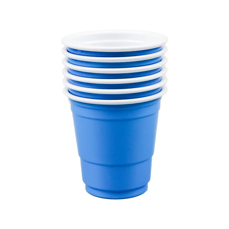 A stack of five blue disposable shot glasses with white rims.