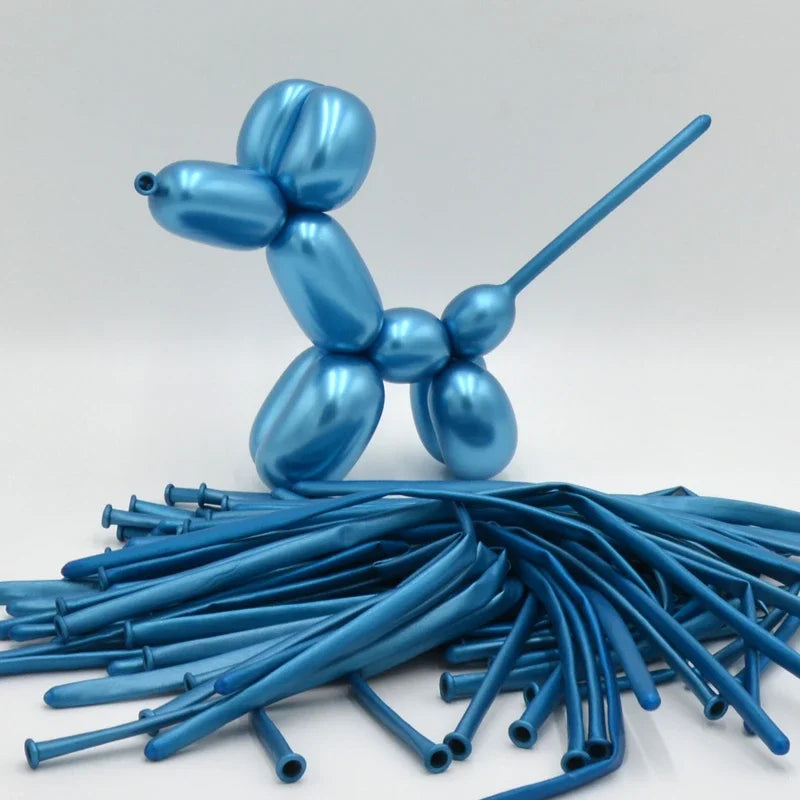 A cluster of glossy blue latex modeling balloons shaped like animals, resting on a white surface.