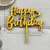 Gold acrylic birthday cake topper set with the words Happy Birthday on a stick
