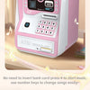 Piggy bank ATM in pink with a keypad for music and savings