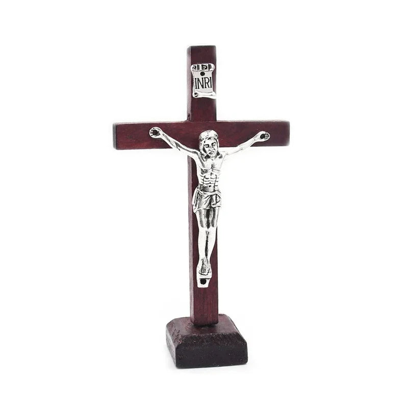 Handcrafted wooden crucifix with a corpus mounted on a stand