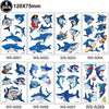 A collection of nine blue shark foil balloons with various poses and colors for ocean-themed party decoration