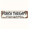 Vintage metal sign with the text porch therapy session in progress