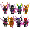 A collection of golden ninja building block figures with various colored accessories and masks.