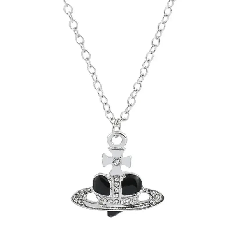 Silver pendant necklace featuring a diamond-inlaid Saturn design.