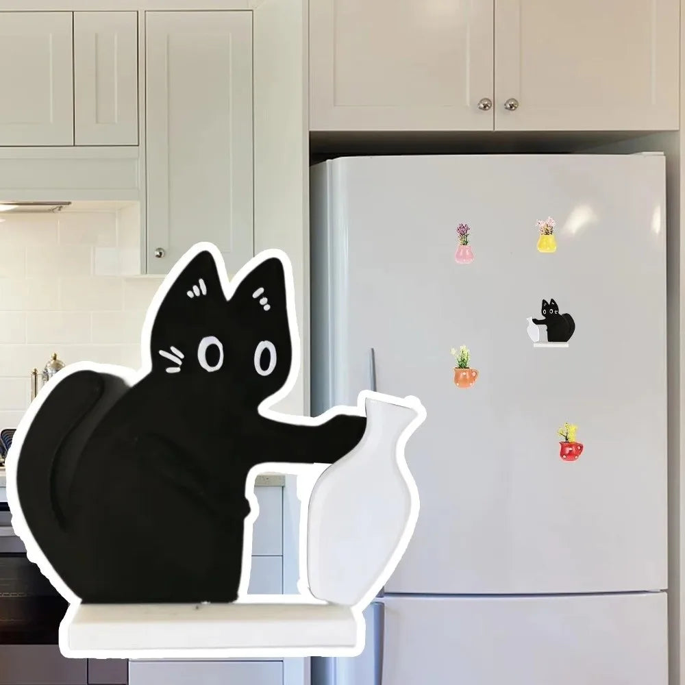 Black acrylic cat whiskers decor attached to a refrigerator