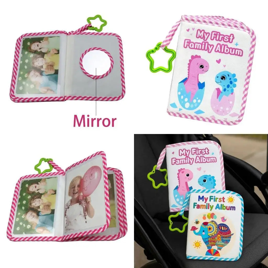 A pink cloth baby photo album with a mirror and a colorful illustration of a dinosaur.