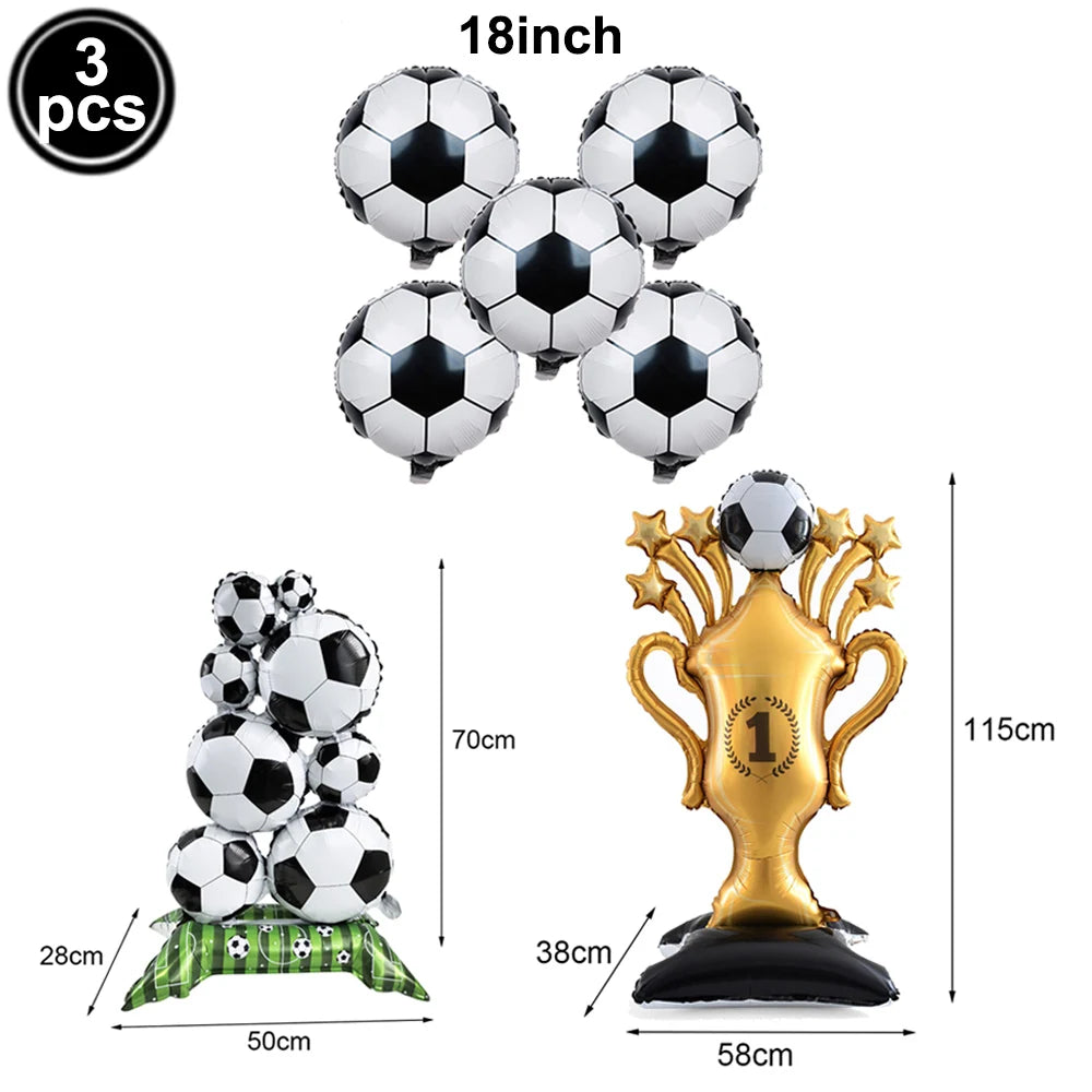 A set of three inflatable soccer balls and a gold trophy decoration for party decor