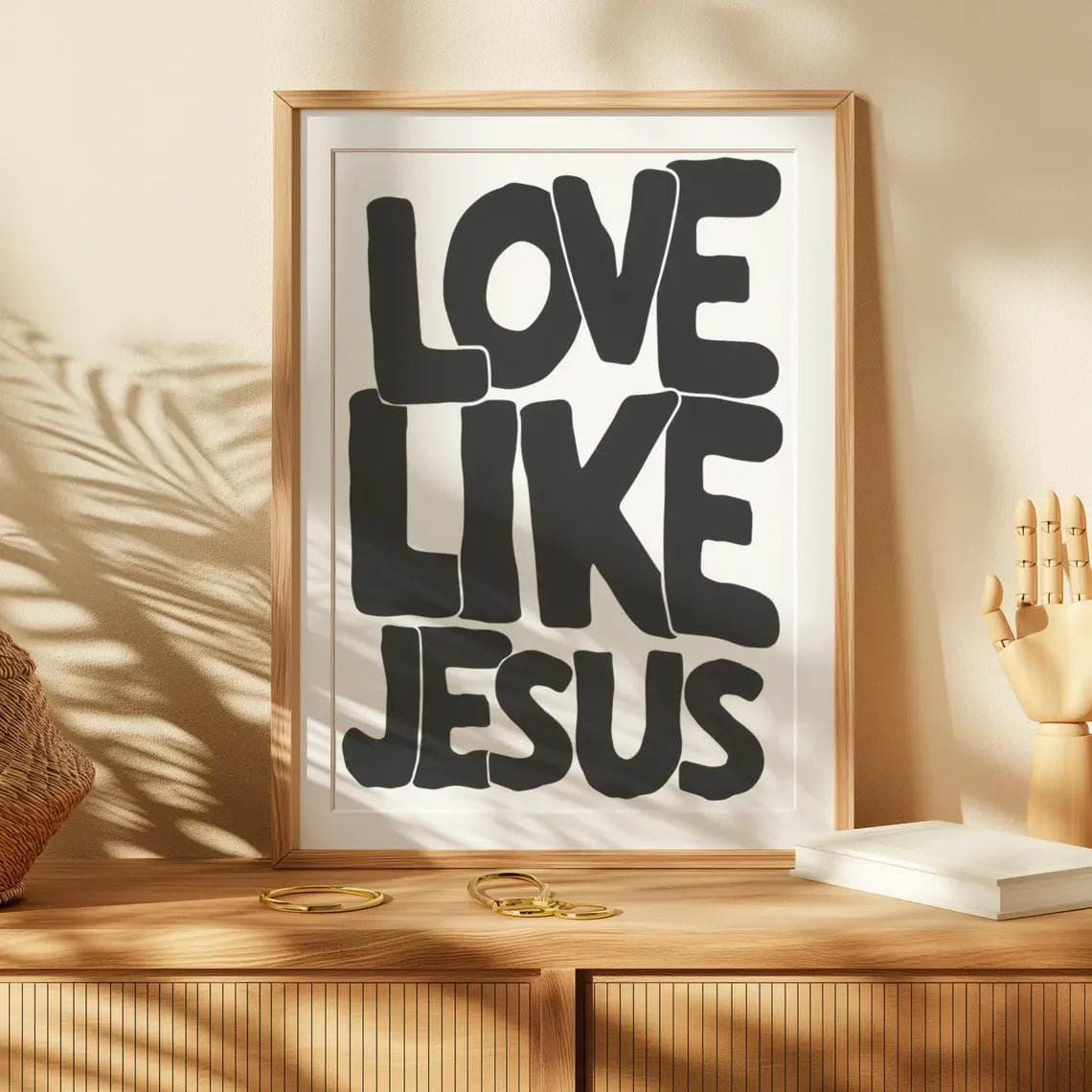 Framed black and white text art on canvas print reading Love Like Jesus