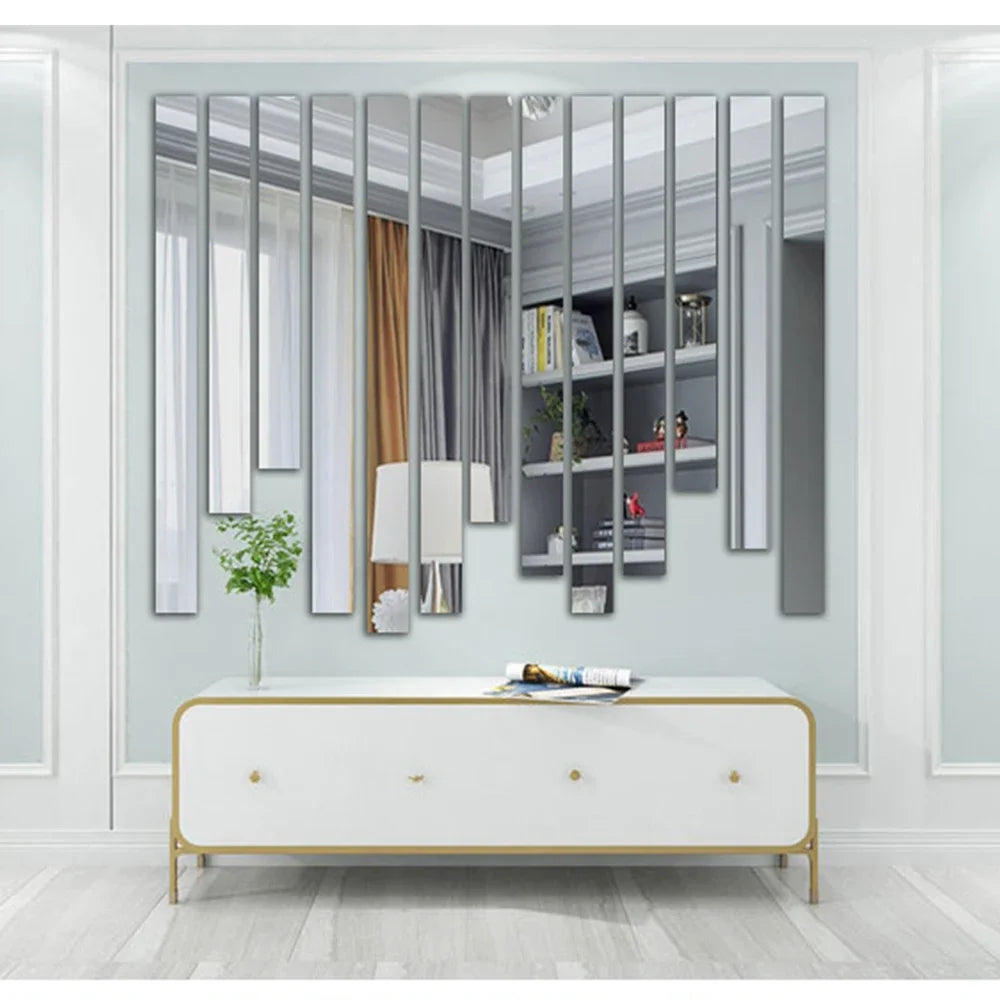 Modern home decor featuring a white cabinet and a wall with vertical acrylic mirror strips.