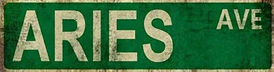 Vintage metal street sign with the text ARIES AVE on a dark green background.
