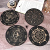 A collection of tarot-style divination cards, including a star wheel and a moon wheel, laid on a wooden surface.