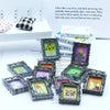 A collection of miniature framed wall art pieces with various floral and nature designs displayed on a white surface.