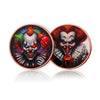 A copper challenge coin featuring a grim reaper design with vibrant hair and facial markings.