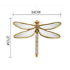 Artisan butterfly wall mirror with an antique gold frame, measuring 34cm long.