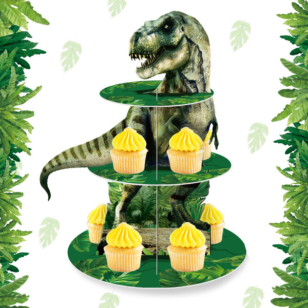 A three-tier dinosaur cupcake stand featuring a dinosaur figure and yellow cupcakes for party decor.