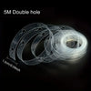 A transparent silicone product showing five meters of double-holed tubing coiled together.