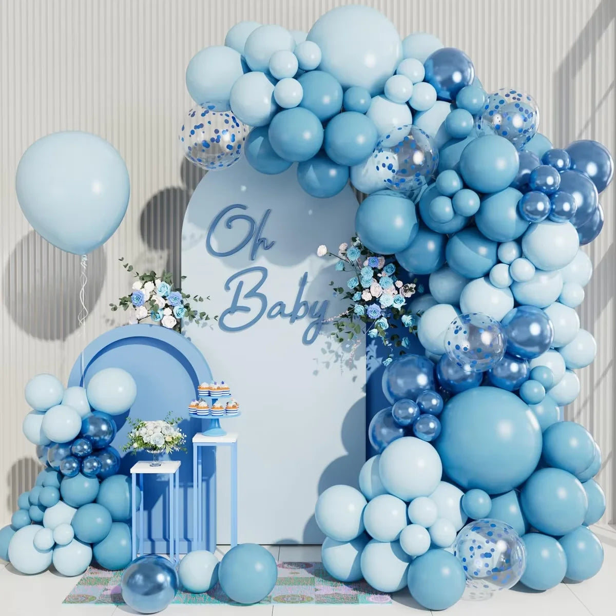 A blue latex balloon garland featuring various shades of light and dark blue balloons arranged in an arch shape.