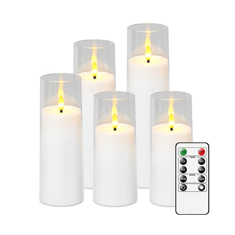 A set of five white flameless LED candles in glass holders with a remote control.