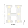 A white alphabet letter light display with an H shape, featuring warm white LED lights.
