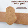 Close-up of clear and delicate wood grain on a solid wood coat rack wall mount.