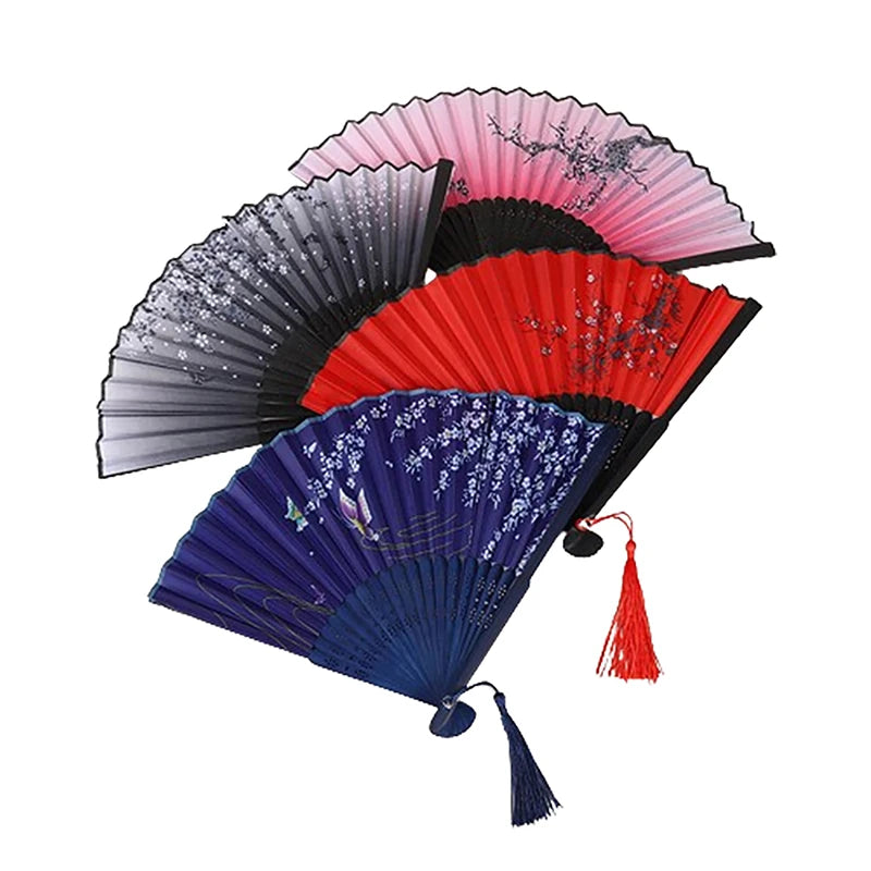 A collection of elegant vintage Chinese folding hand fans in various colors including black, gray, pink, and red.