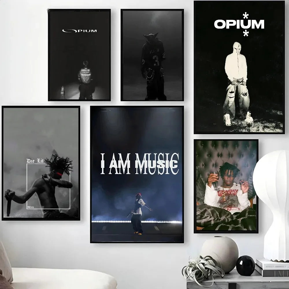 A collection of black and white canvas wall art featuring figures and text related to Playboi Carti and Opium.