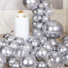 A display of metallic silver balloons and confetti accents arranged in an arch or cluster.