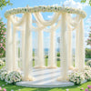 Elegant white tulle backdrop with draping and floral accents for an outdoor event or celebration.