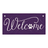 A purple wooden hanging sign with white script that reads Welcome and features a paw print.
