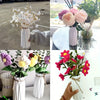 A collection of modern origami plastic vases in white and pink, featuring abstract folded designs.