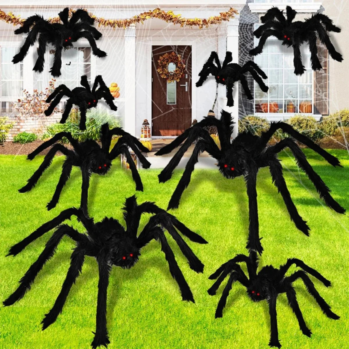 Giant plush black spider Halloween decoration with eight legs displayed on green grass.