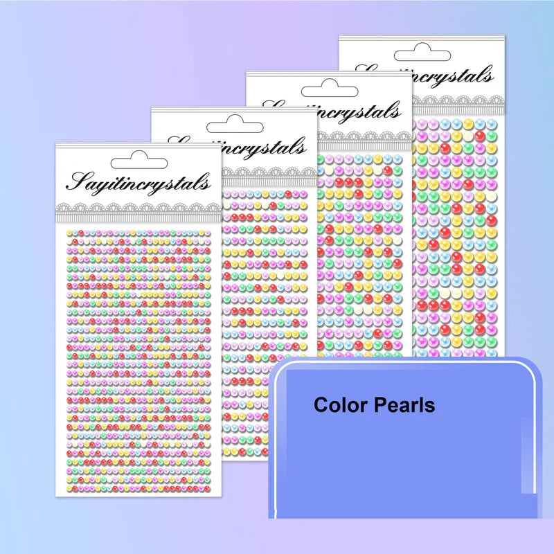A collection of colorful self-adhesive rhinestone embellishments packaged in clear plastic bags.